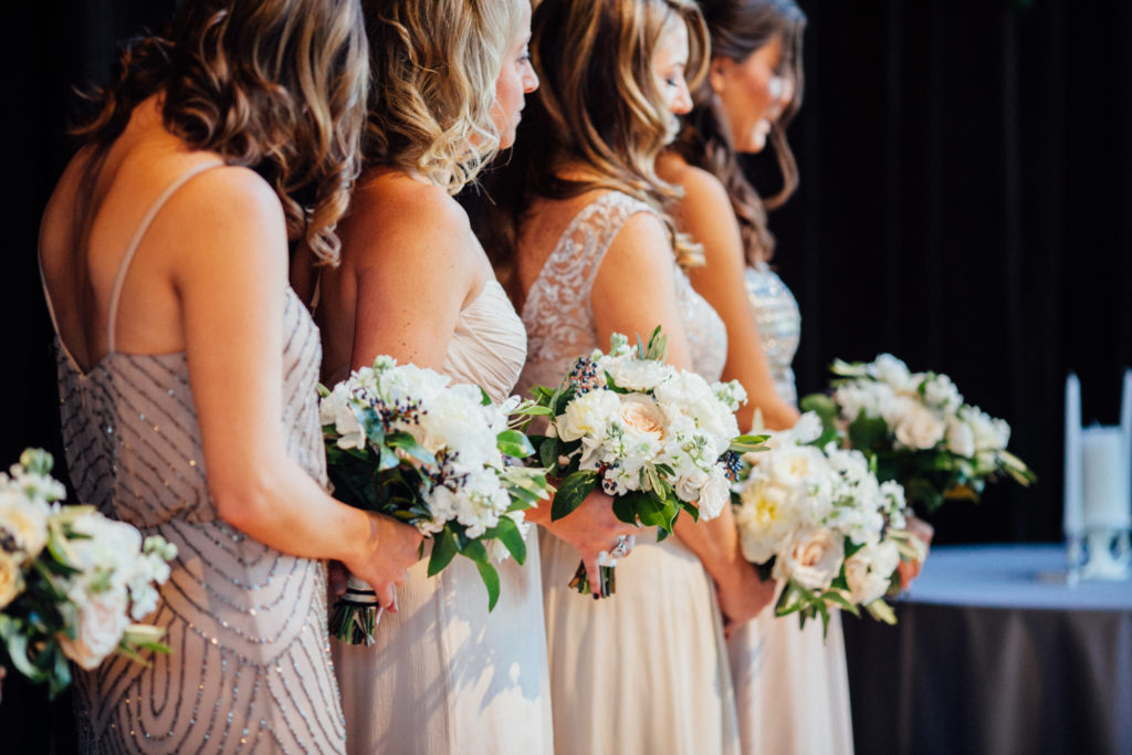 Flowers by Pollen. Photography by Tim Tab Studios. Bridesmaids with bouquets.