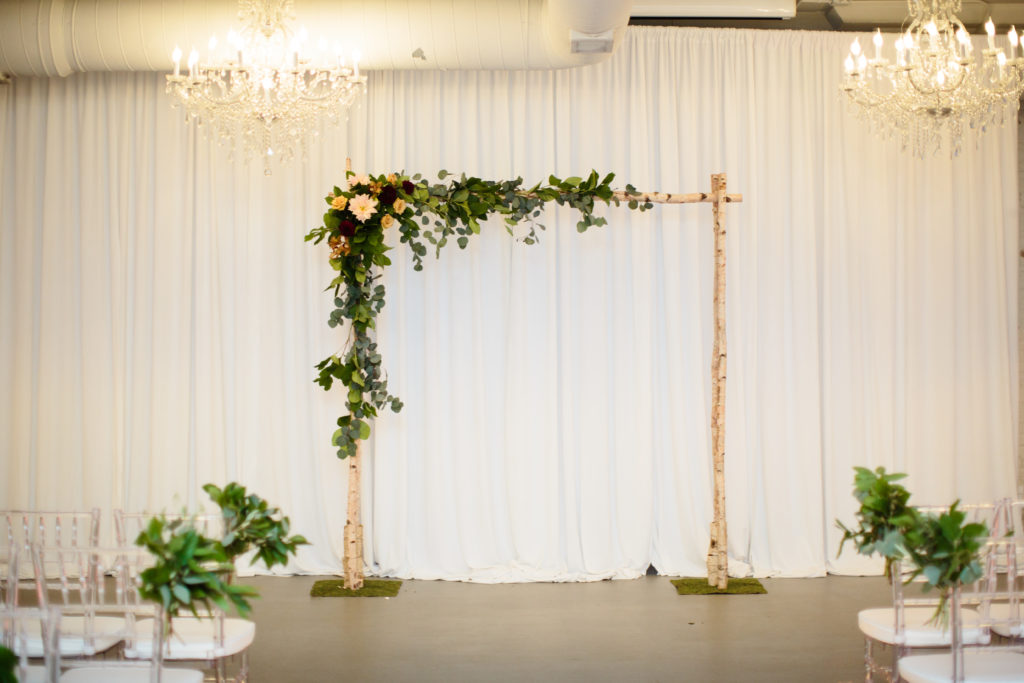 birch wedding ceremony arch for fall wedding ceremony at Room 1520 in Chicago.