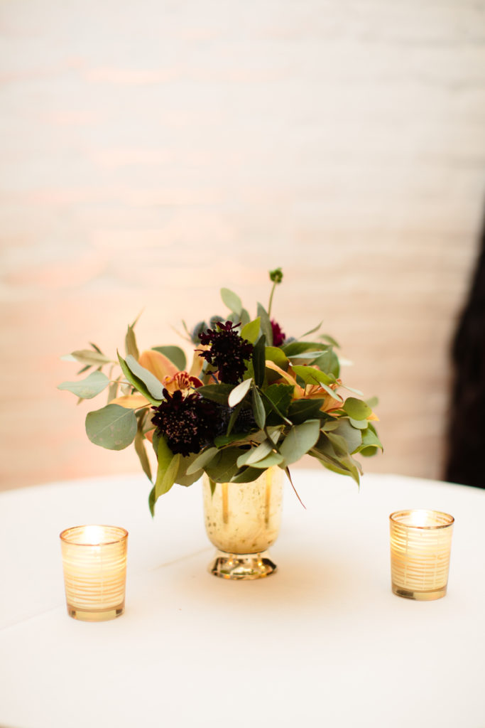highboy floral arrangement in gold vase