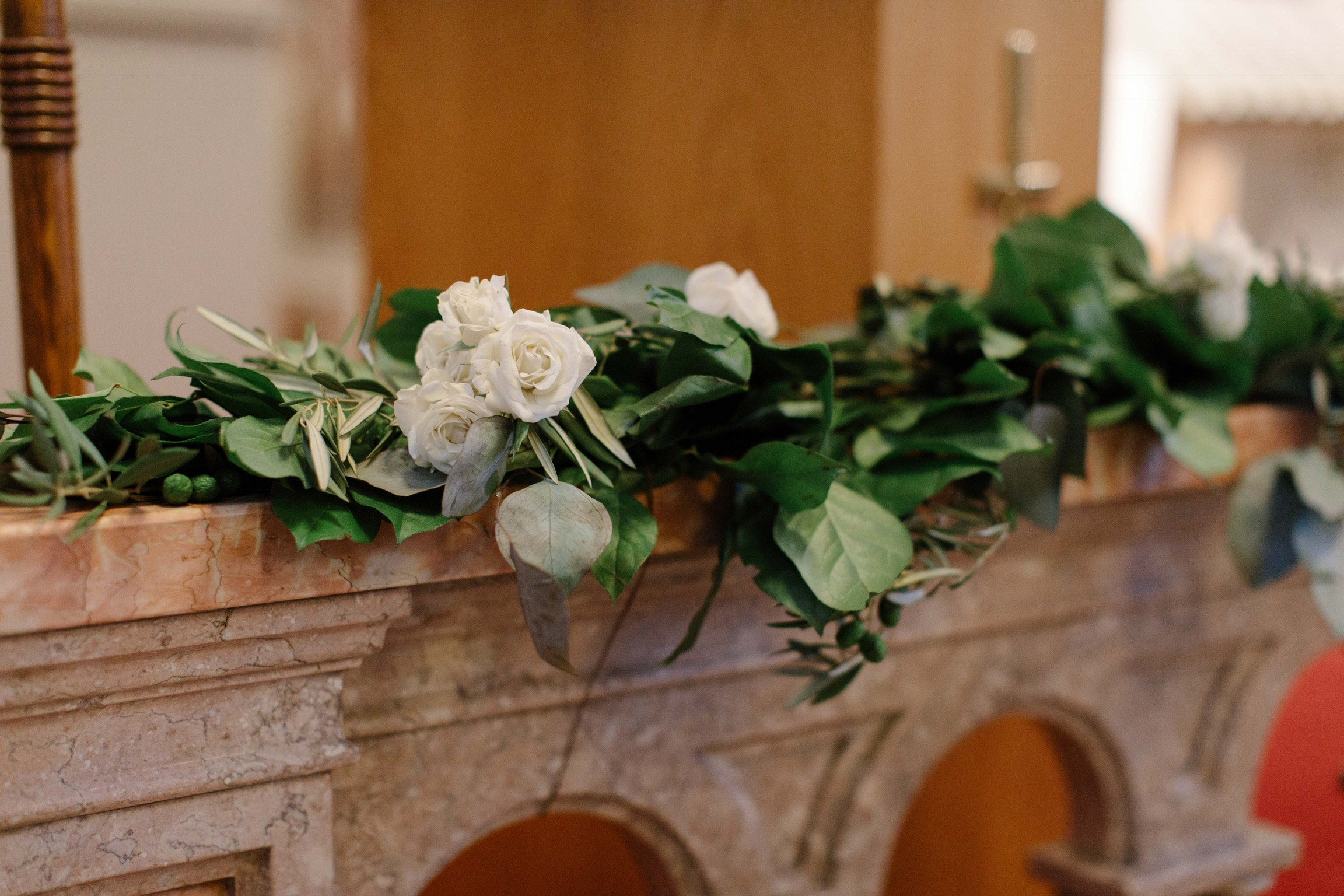 garland on marble railings at Assumption Catholic Church in Chicago