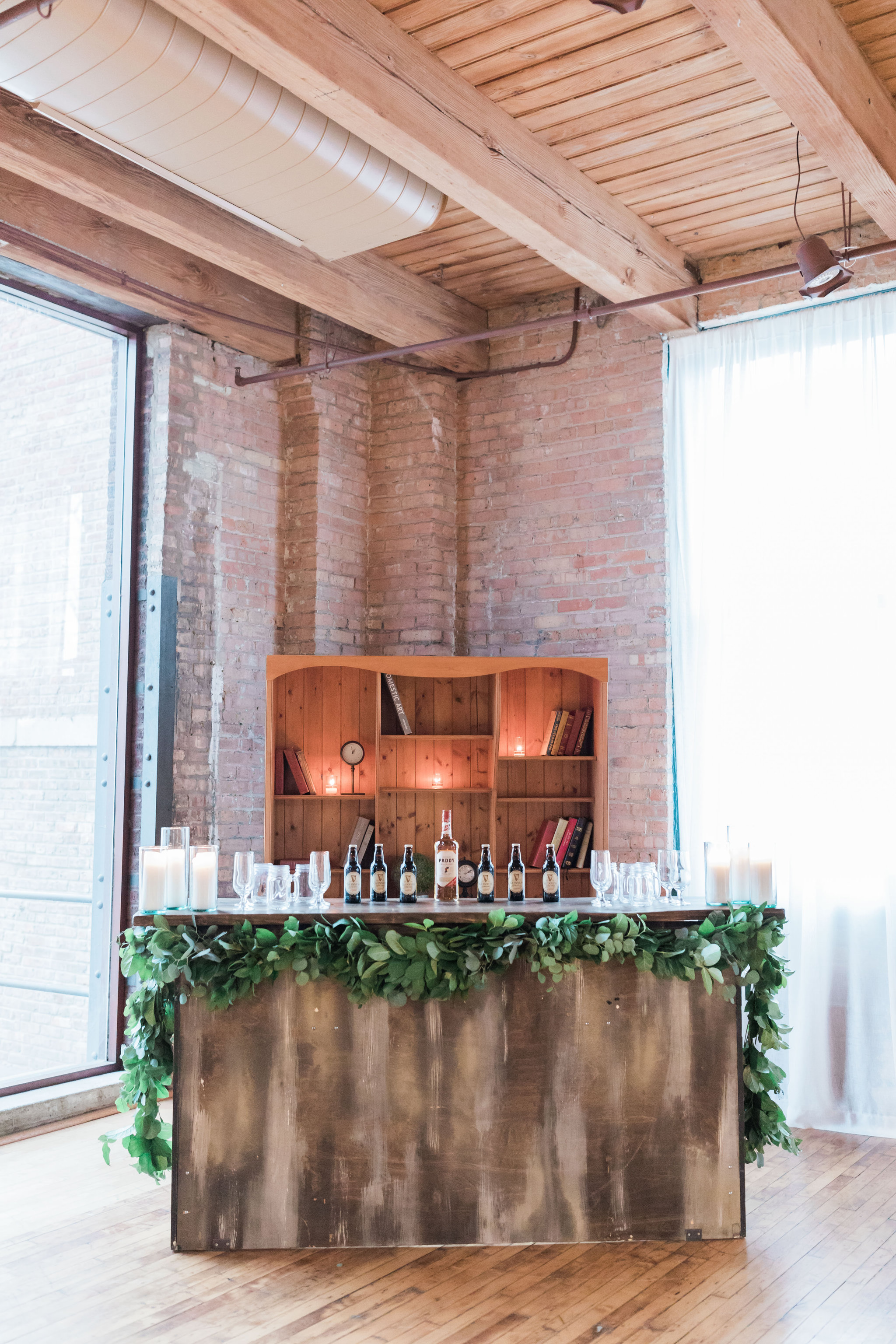 Bar decorated with garland at Bridgeport Art Center in Chicago.