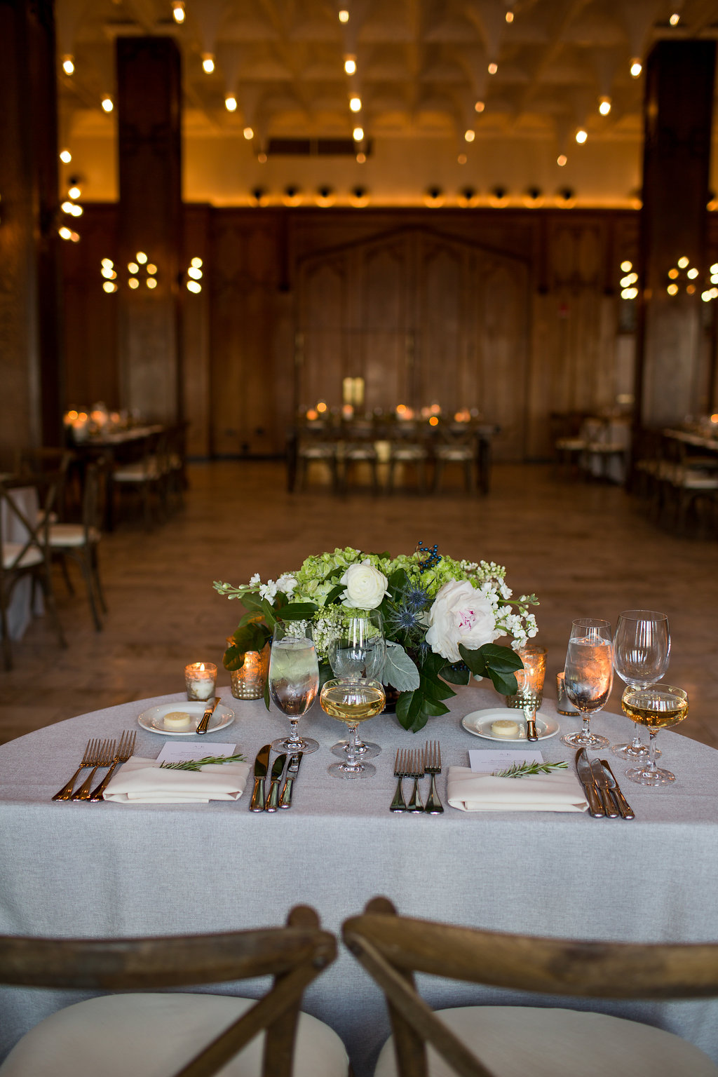 Sweetheart table at Chicago Athletic Association, with peonies, hydrangea, dusty miller, thistle.