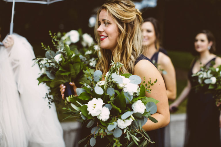Lush bouquets of lisianthus and foliage with eucalyptus for autumn wedding.