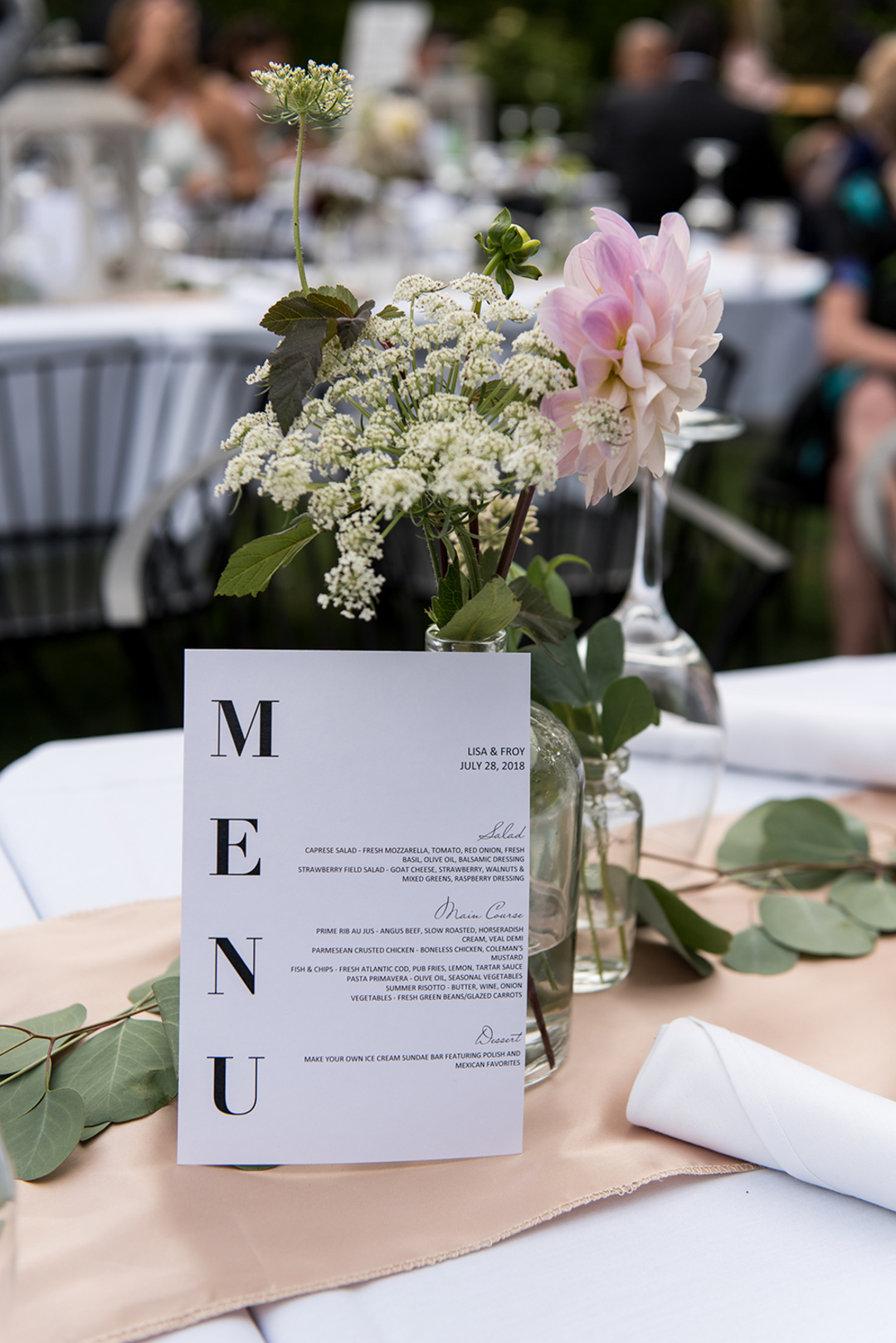 Pale pink dahlia with Queen Anne's lace at summer wedding in Chicago.