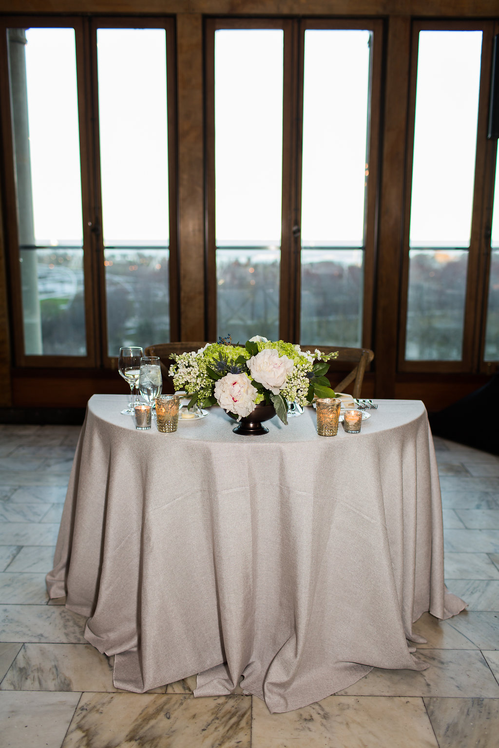 Sweetheart table centerpiece for spring wedding at Chicago Athletic Association.