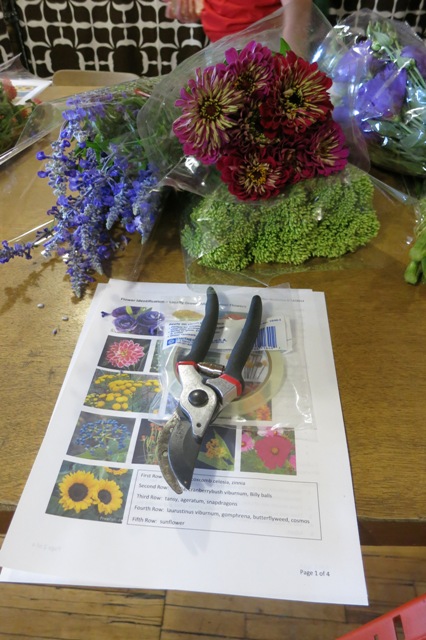 Shears, handouts, bunches of flowers