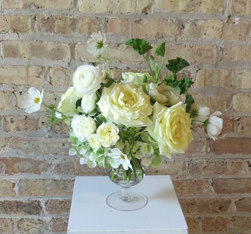 White and green summer floral centerpiece.