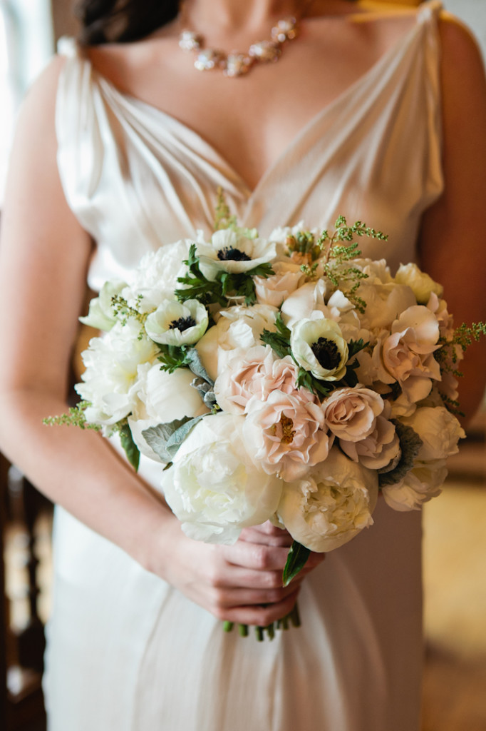 Blush and ivory winter bridal bouquet with peonies, anemone, astilbe, garden roses