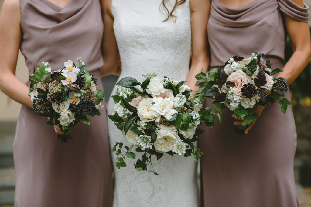 Classic, garden party style wedding with a color palette of taupe, mauve, blush, and ivory and included Quicksand roses, burgundy scabiosa, viburnum berries, Japanese anemone, black Queen Anne's lace, ninebark, and English ivy.