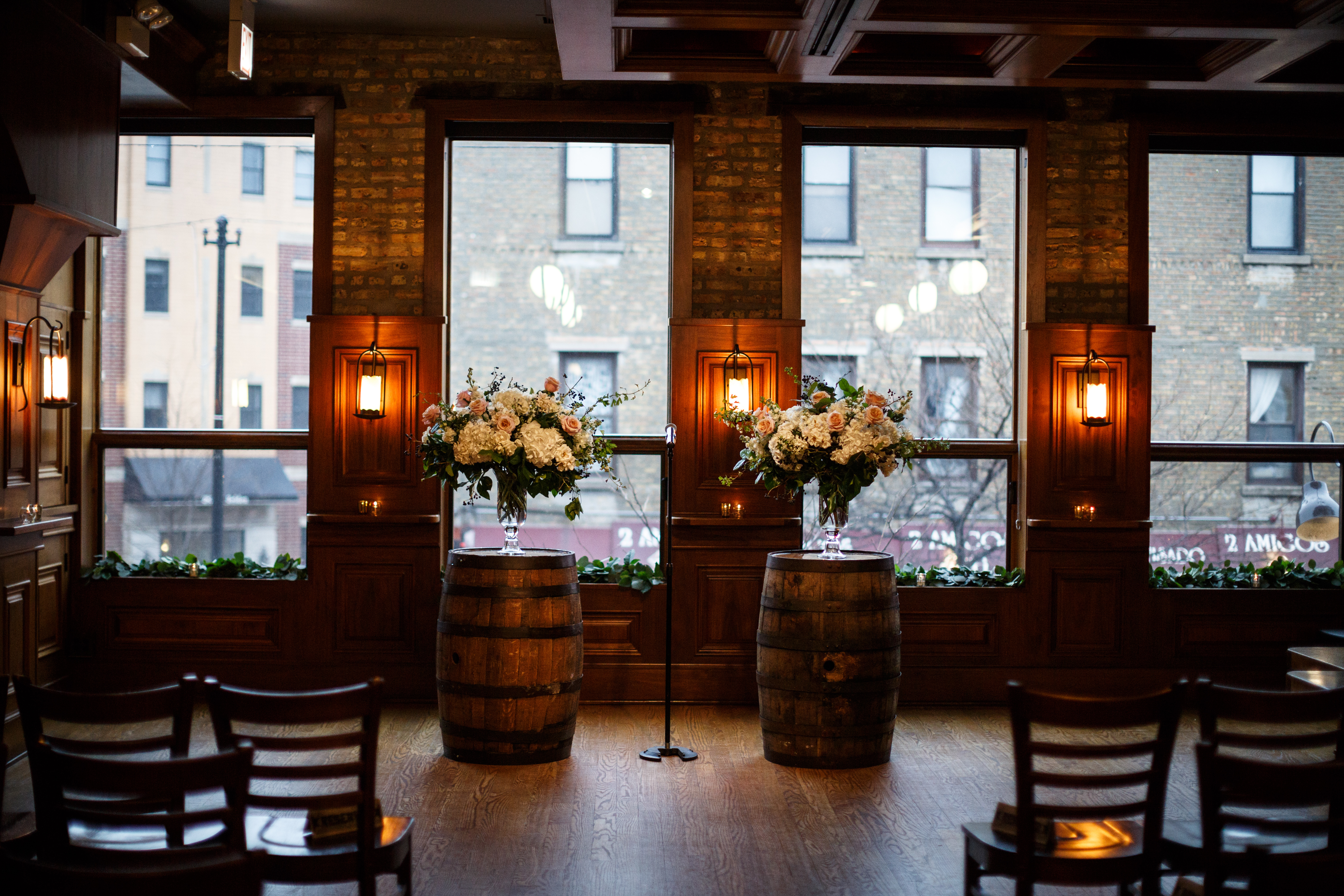 Two gardeny arrangements, foliage-lined windows sills, and Revolution Brewing’s rustic space made for an atmosphere that was fresh and inviting.