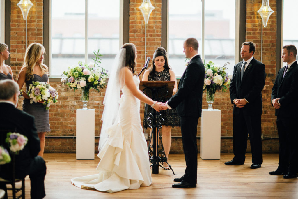 Bride and groom and purple, ivory, and green spring wedding at City View Loft in Chicago.