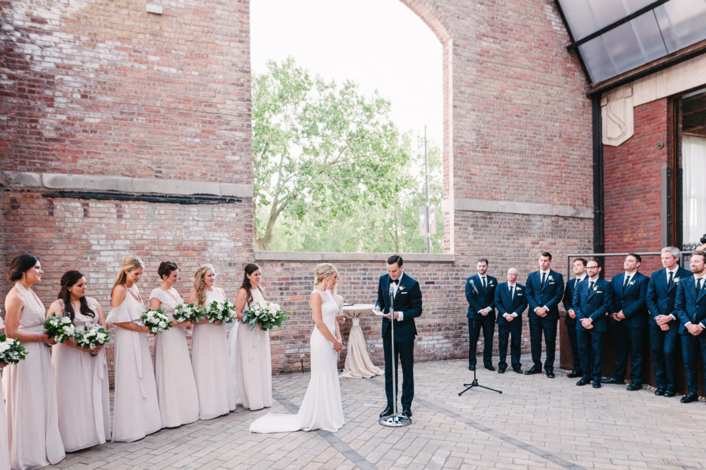 Classic outdoor ceremony at Bridgeport Art Center's Sculpture Garden in Chicago with a palette of ivory and blush.
