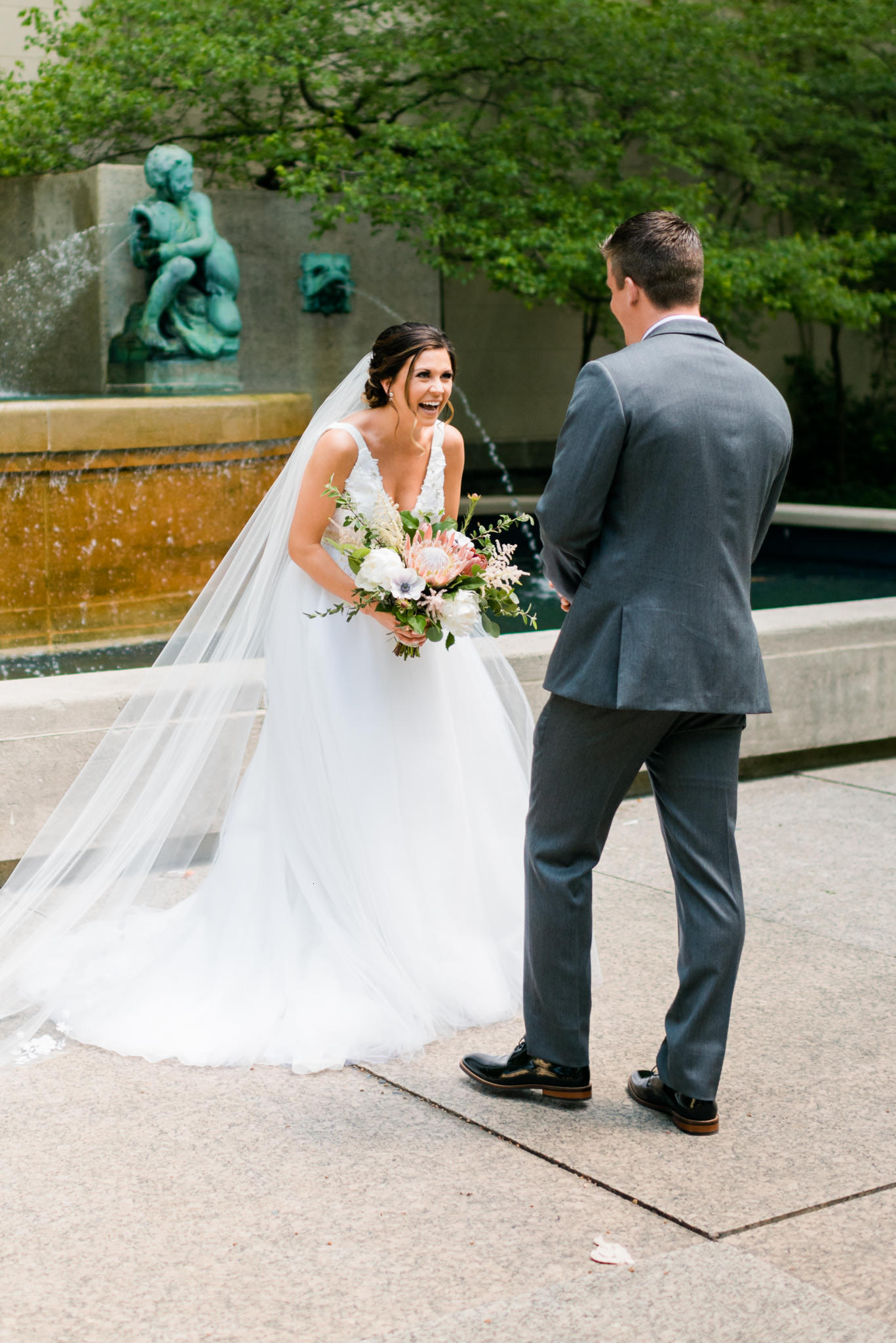 Bride and groom reveal in South Garden at the Art Institute of Chicago for spring wedding at River Roast.
