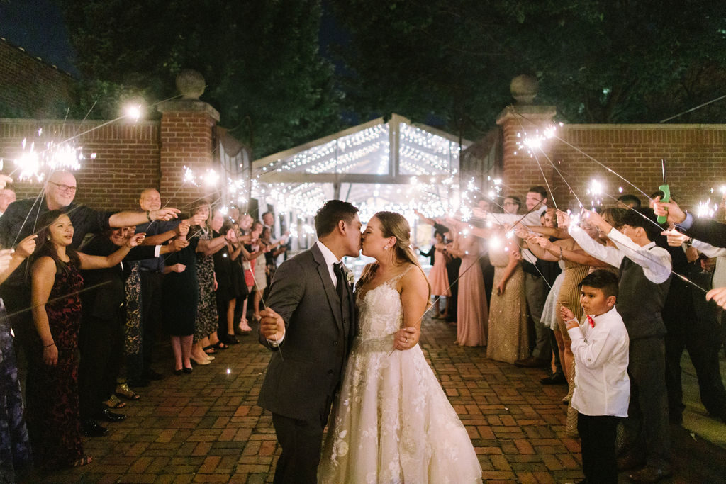 Celebratory, sparkling end to an outdoor summer wedding reception in Chicago. 