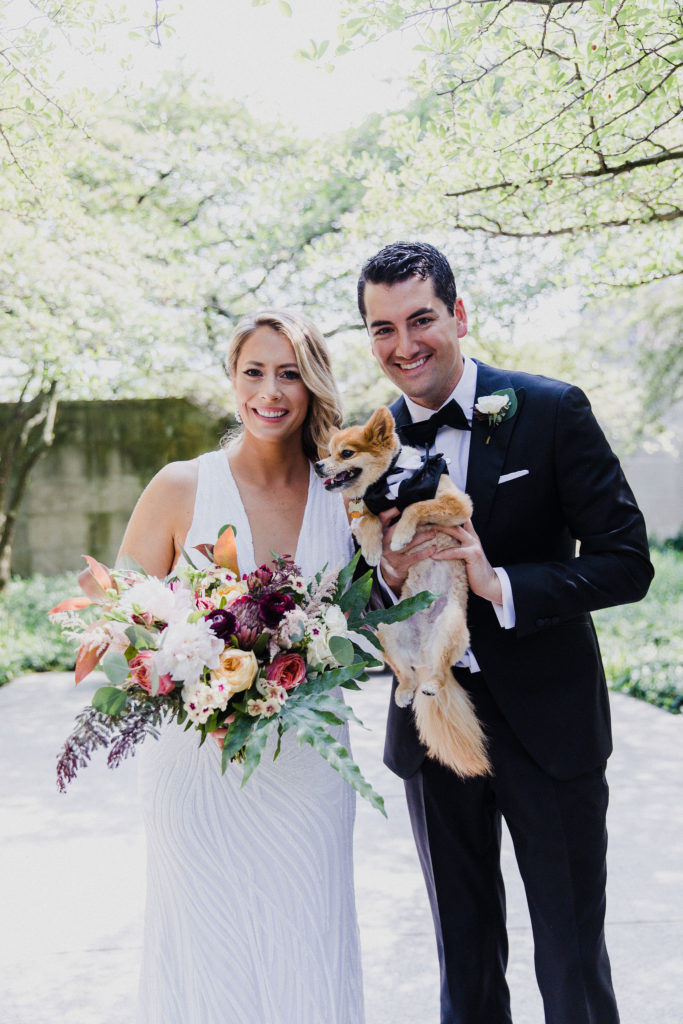 Chicago bride and groom (and pup!) with a luxe bohemian bouquet filled with vivid shades and flowers like ranunculus, protea, peonies, astilbe.