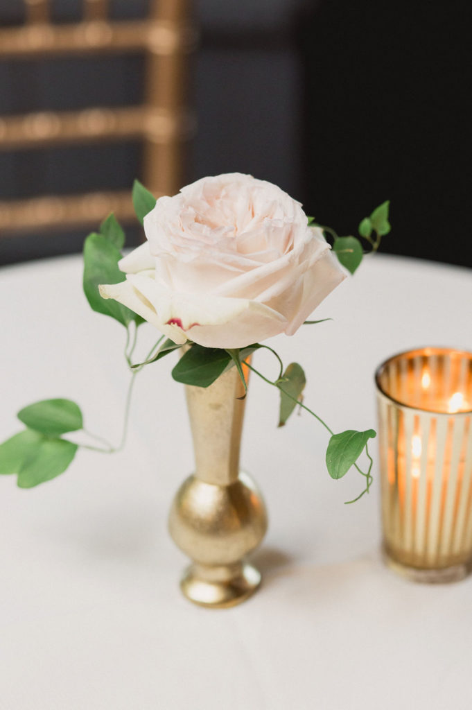 A single rose never ceases to be captivating in an of itself…pair with dainty foliage and distinct vases, et voila! 
A perfect floral moment for a traditional fall wedding.