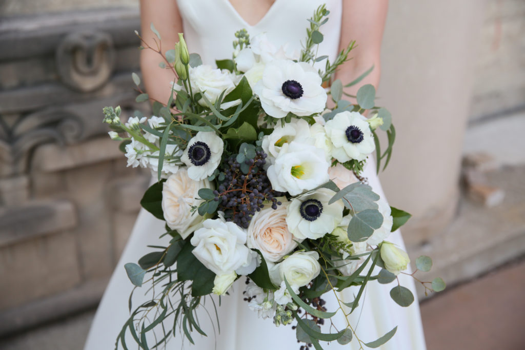 Gardeny, monochromatic bouquet of garden roses, anemone, berries, lisianthus, and eucalyptus for a wedding at Artifact Events Chicago. 