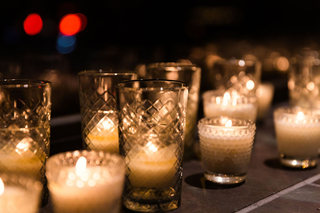 Hand-poured soy votive candles to set the atmosphere for this winter wedding at Floating World Gallery in Chicago. 