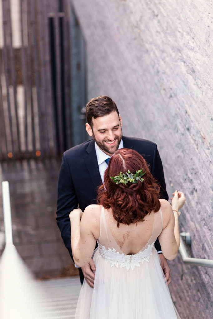 First peek with bride and groom; bride wore a dainty foliage hairpiece for a garden-style look.