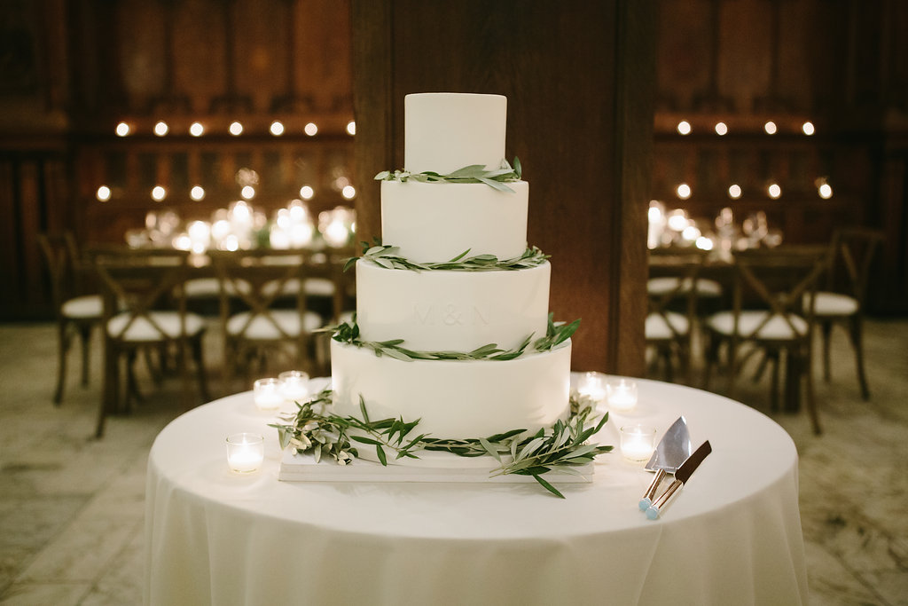Elegant four-tier cake with foliage details for a winter wedding at Chicago Athletic Association.