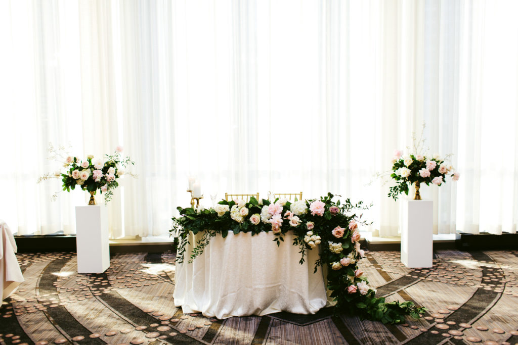 Ceremony flowers reused at a sweetheart table at LondonHouse Chicago.
